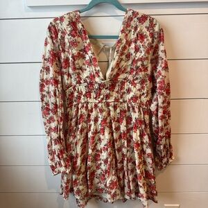 Brand new Free People dress with V-neck front and cinching V-neck back w/ button